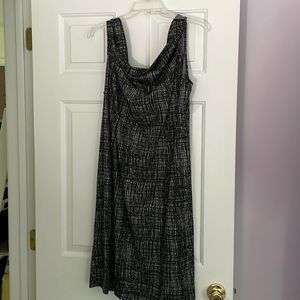 Ann Taylor stretch fabric black dress with slight cowl neck and white design